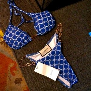 - Gucci Swimsuit size medium 2 piece. New with tags.